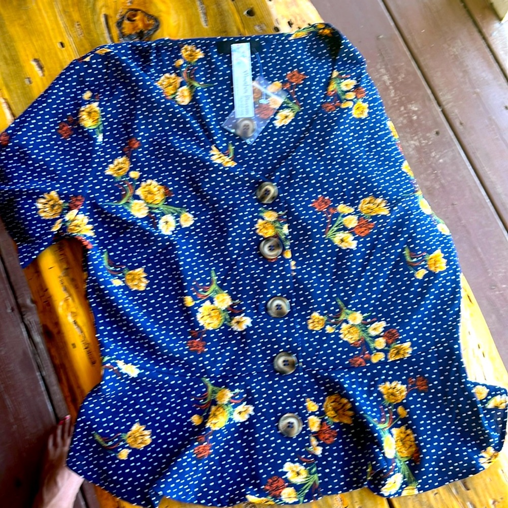 Mine navy blue blouse with ties sleeves size Medium.